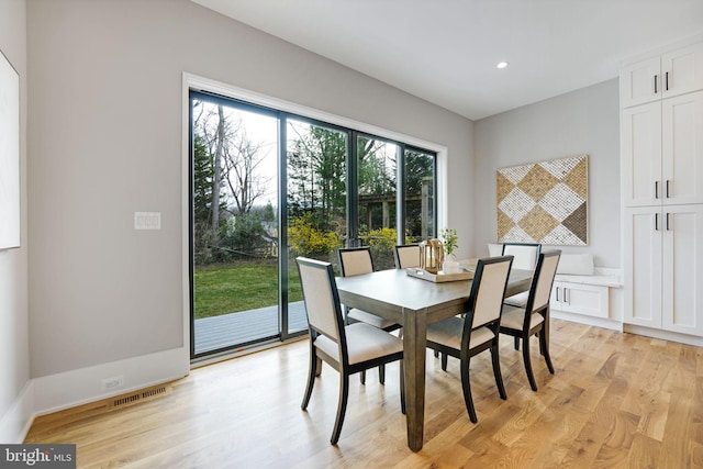 dining room with light wood-type flooring