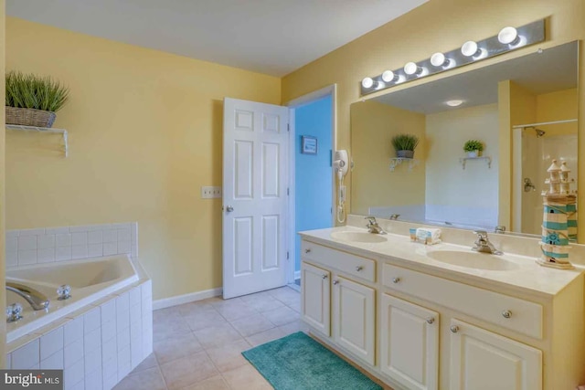 bathroom with vanity, separate shower and tub, and tile patterned floors