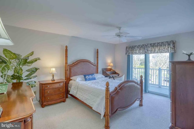 carpeted bedroom with ceiling fan and access to exterior