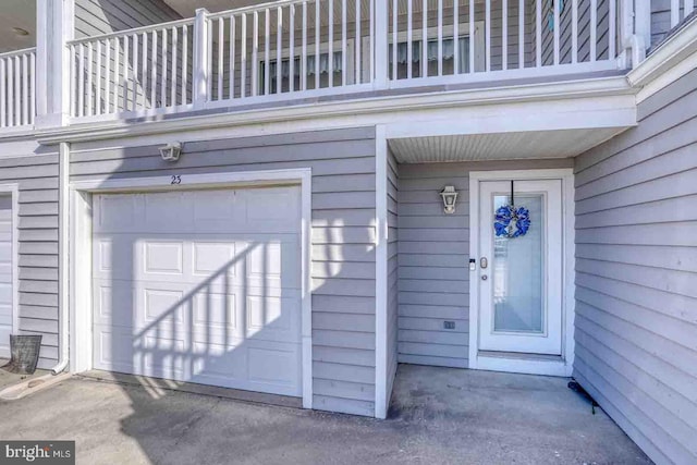 entrance to property with a balcony