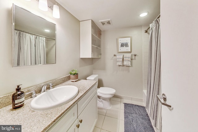 full bathroom featuring shower / tub combo with curtain, vanity, toilet, and tile patterned floors