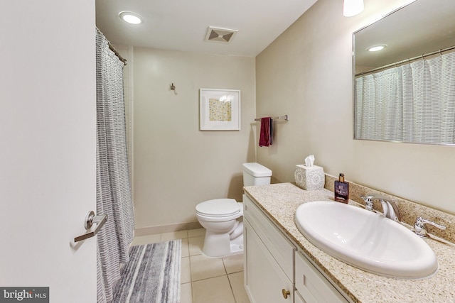 bathroom featuring walk in shower, tile patterned flooring, vanity, and toilet