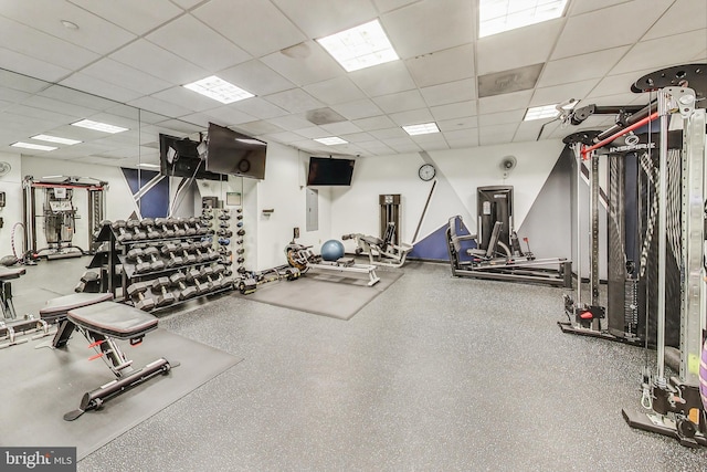 gym featuring a drop ceiling