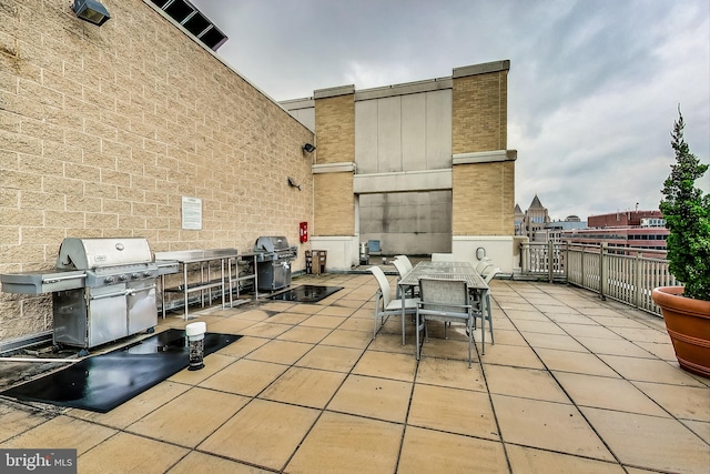 view of patio with a grill