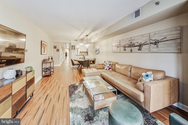 living room featuring light wood-type flooring