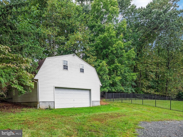 garage with a yard