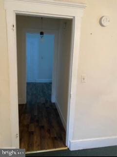 hall featuring dark hardwood / wood-style floors