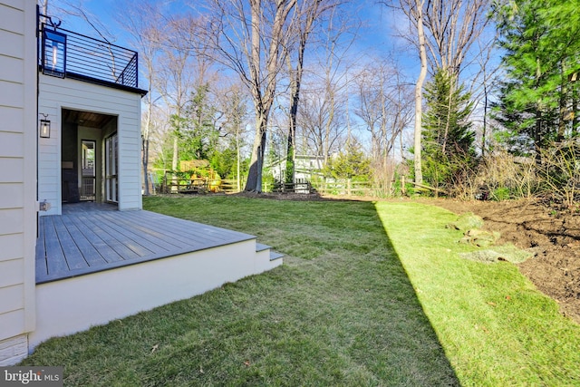 view of yard featuring a wooden deck