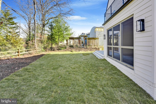 view of yard featuring a sunroom