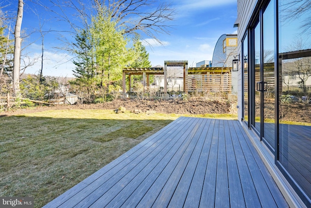 deck with a lawn and a pergola