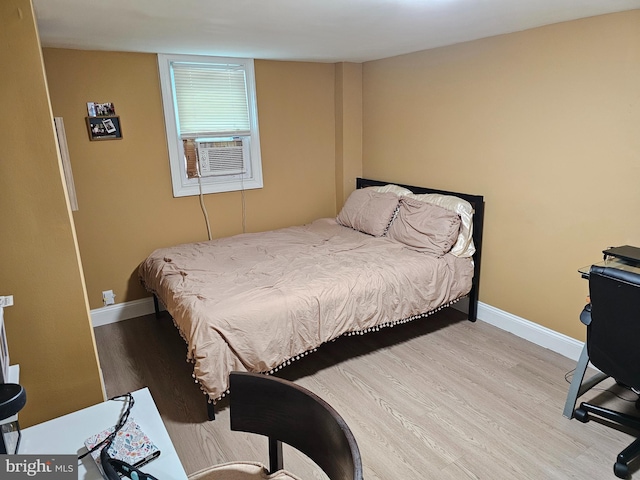 bedroom featuring light wood-type flooring