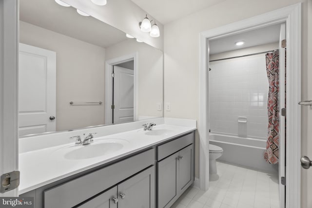 full bathroom featuring vanity, tile patterned flooring, toilet, and shower / bathtub combination with curtain