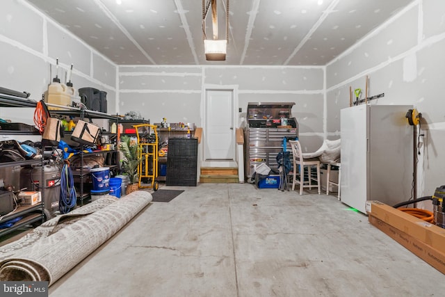 garage with white fridge