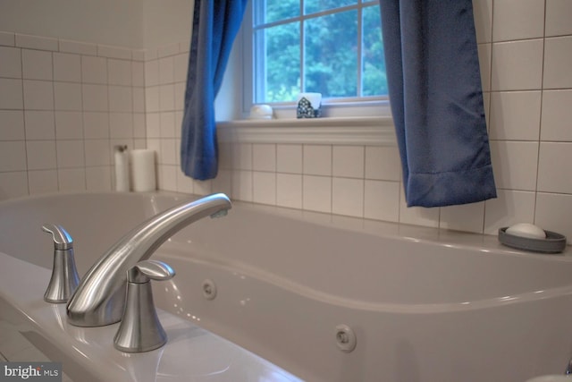 bathroom featuring a tub