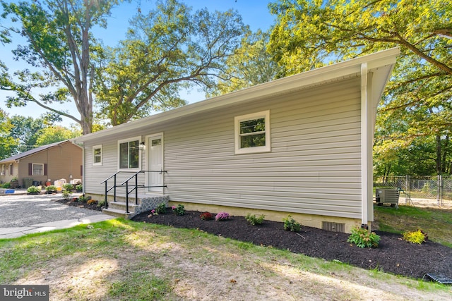 view of front of property featuring central AC unit