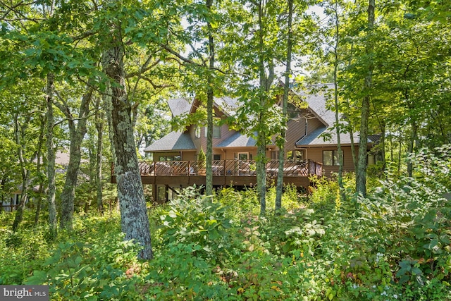 rear view of property with a deck