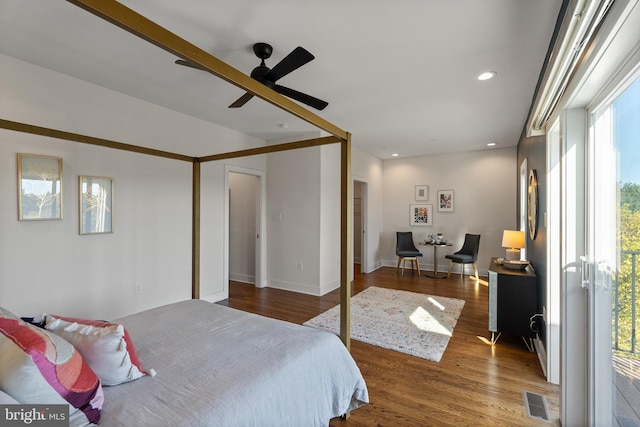 bedroom featuring ceiling fan and hardwood / wood-style flooring