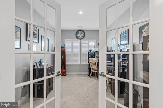 home office featuring carpet and french doors