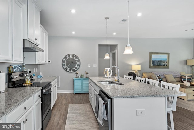 kitchen with dishwasher, dark hardwood / wood-style floors, white cabinetry, a kitchen bar, and black / electric stove