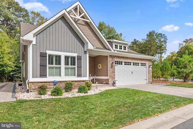 view of front of home with a garage and a front lawn