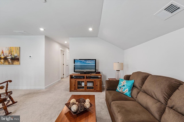 living room with lofted ceiling and light colored carpet