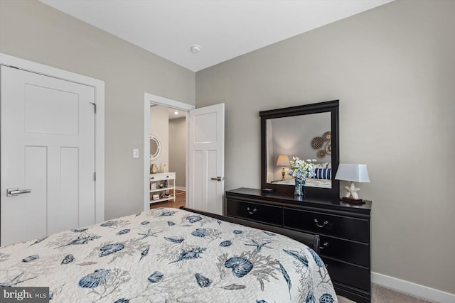 bedroom featuring carpet