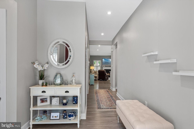 hallway with wood-type flooring