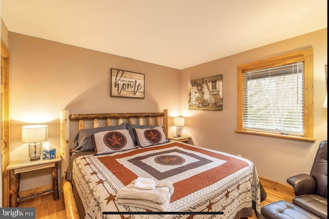 bedroom featuring hardwood / wood-style floors