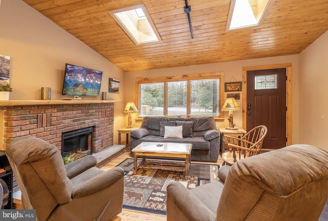 living room featuring wooden ceiling, vaulted ceiling with skylight, a fireplace, and wood-type flooring