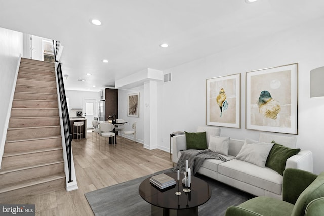 living room with light wood-type flooring