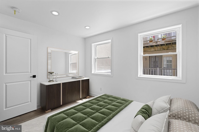 bedroom with wood-type flooring