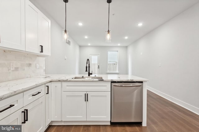 kitchen with dishwasher, light stone counters, white cabinetry, and hanging light fixtures