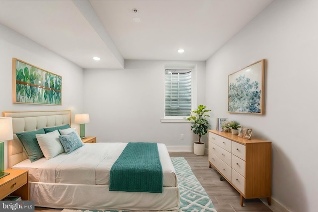 bedroom with light hardwood / wood-style flooring