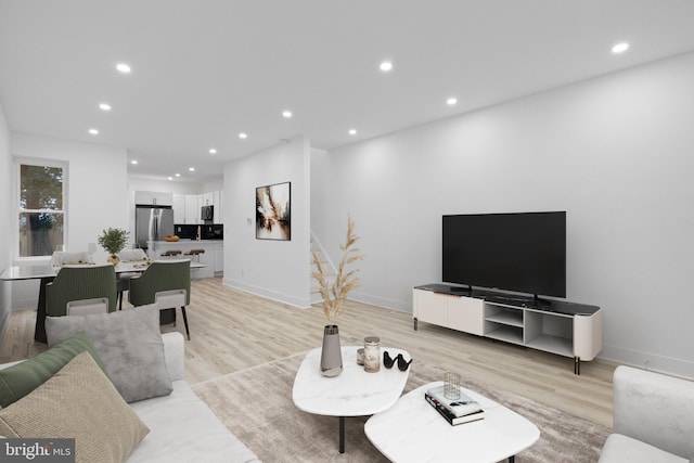 living room featuring light wood-type flooring