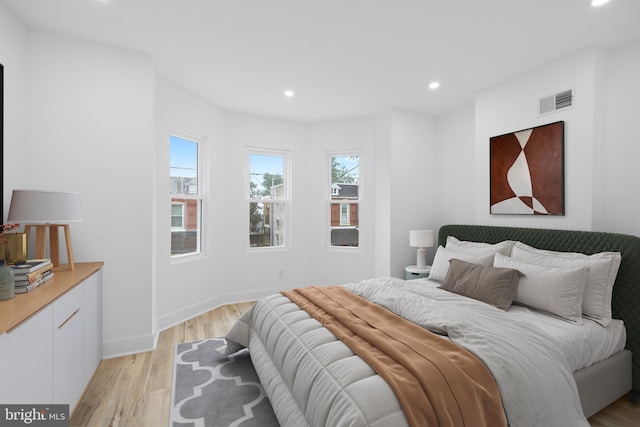 bedroom with light wood-type flooring