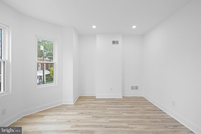 unfurnished room featuring light hardwood / wood-style flooring