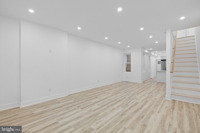 unfurnished living room with light wood-type flooring