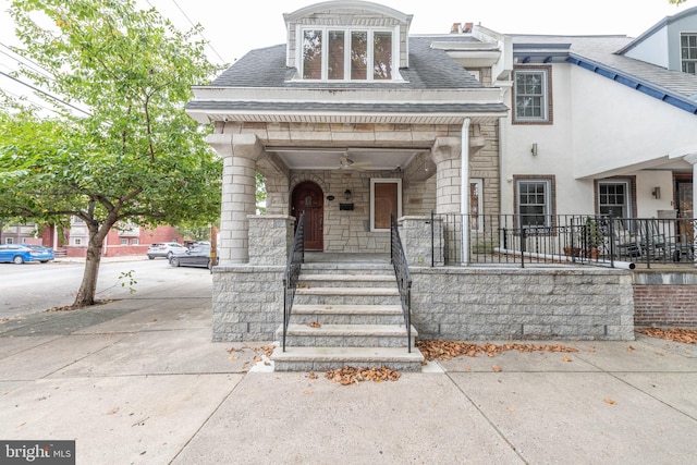 view of front of home featuring covered porch and ceiling fan