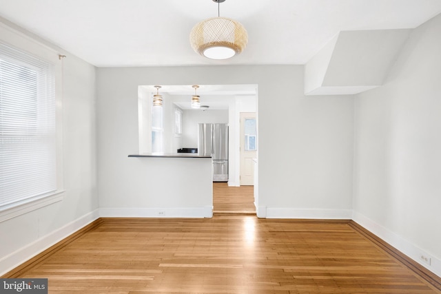 interior space with hardwood / wood-style flooring