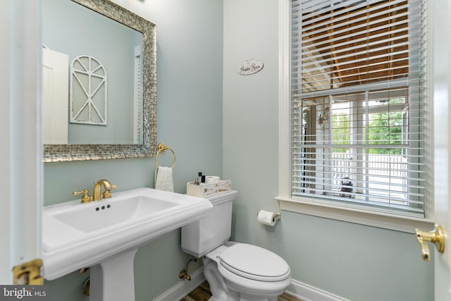 bathroom with sink and toilet