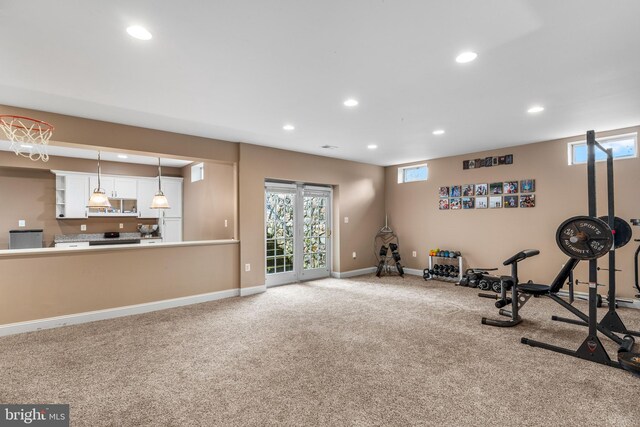 exercise area featuring carpet flooring