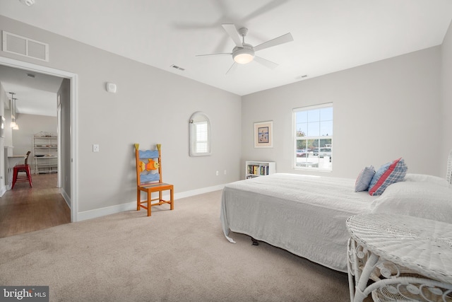 carpeted bedroom featuring ceiling fan