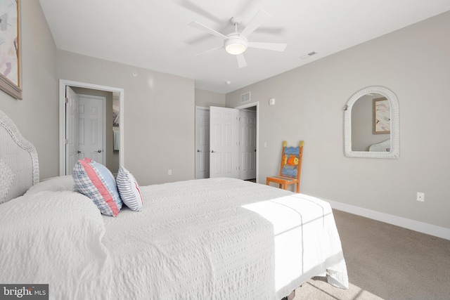 carpeted bedroom featuring ceiling fan