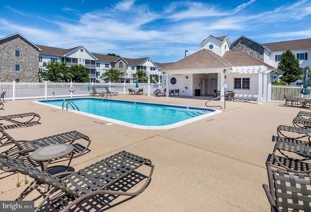 view of pool featuring a patio