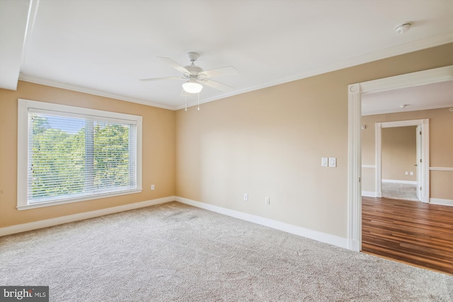 spare room featuring ceiling fan, ornamental molding, and hardwood / wood-style floors