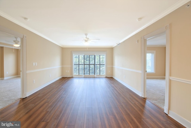 unfurnished room with ornamental molding, dark hardwood / wood-style floors, and ceiling fan