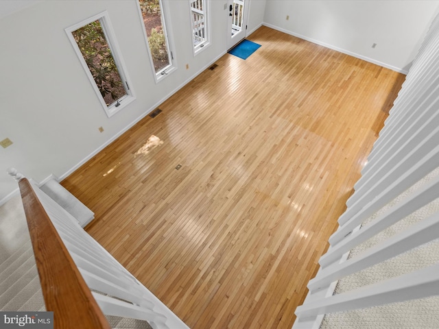 details with hardwood / wood-style flooring