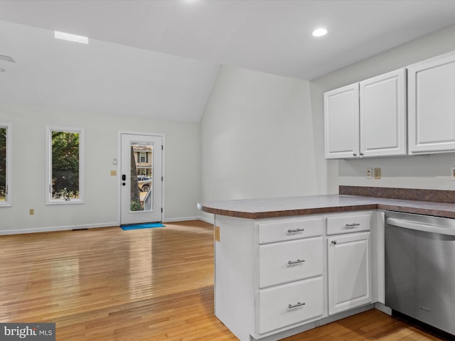 kitchen featuring light hardwood / wood-style flooring, dishwasher, white cabinets, and kitchen peninsula