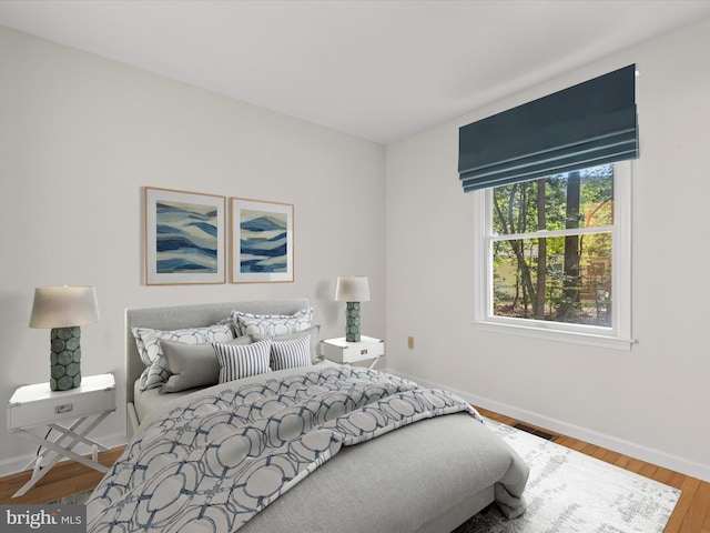 bedroom featuring hardwood / wood-style floors