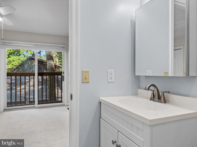 bathroom featuring vanity and ceiling fan